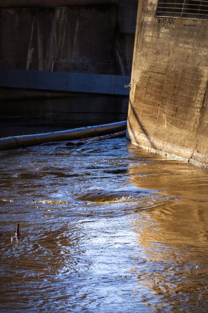 concrete wall with glistening water flow